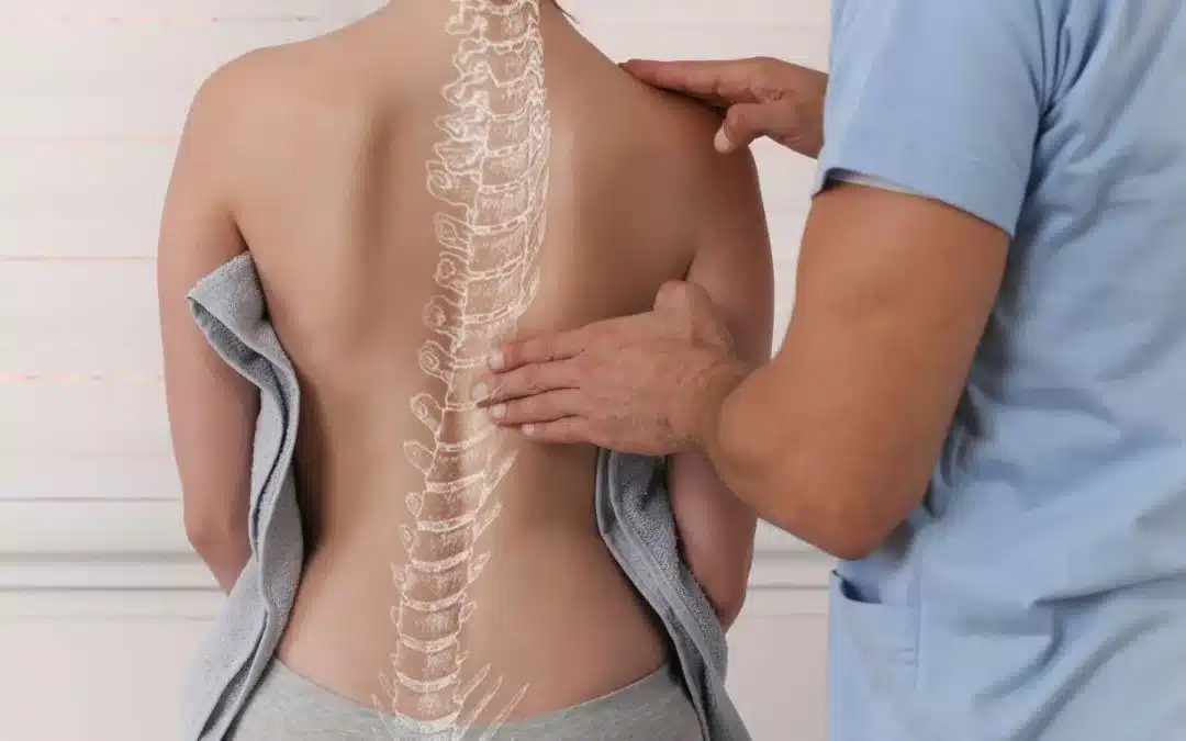 woman-back-spine-physio-shutterstock_1537703249-1080x675jpg » HCi Physio, chiro or osteo Health professional looking at a patient's back with graphic of spine superimposed » HCi