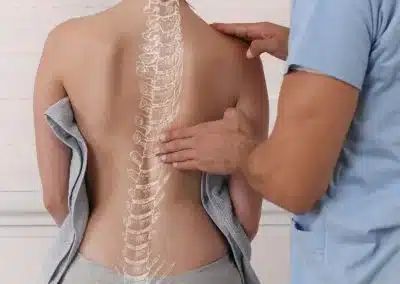 woman-back-spine-physio-shutterstock_1537703249-400x284jpg » HCi Physio, chiro or osteo Health professional looking at a patient's back with graphic of spine superimposed » HCi