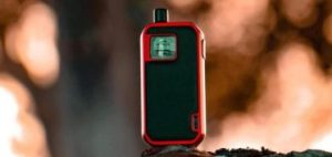 Photo of an orange and green vape device on a rock to inform HCi members about vape claims